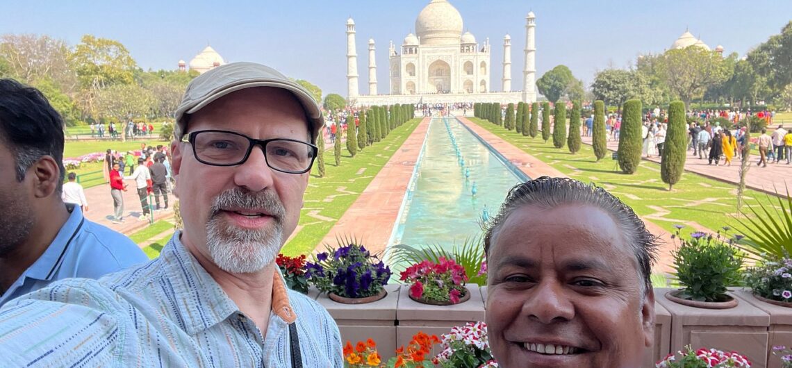 Travelers with a local guide during a Taj Mahal tour in Agra