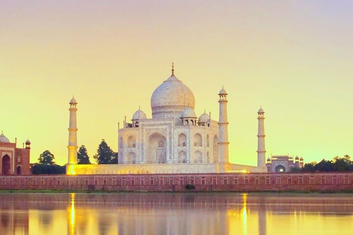 Taj Mahal in soft early morning light with reflection